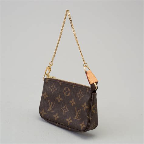 mini lv purse|louis vuitton small black purse.